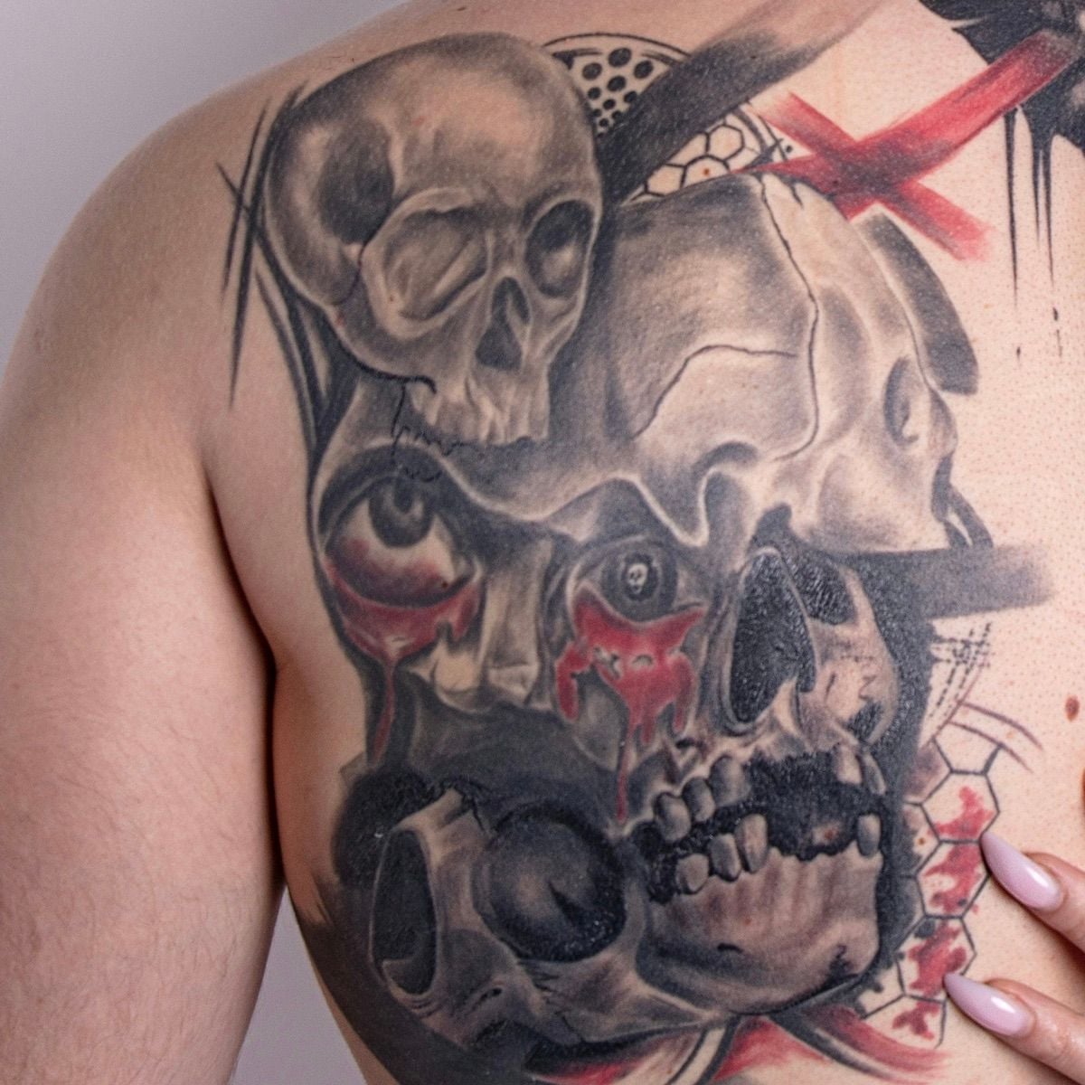 Skull shoulder tattoo