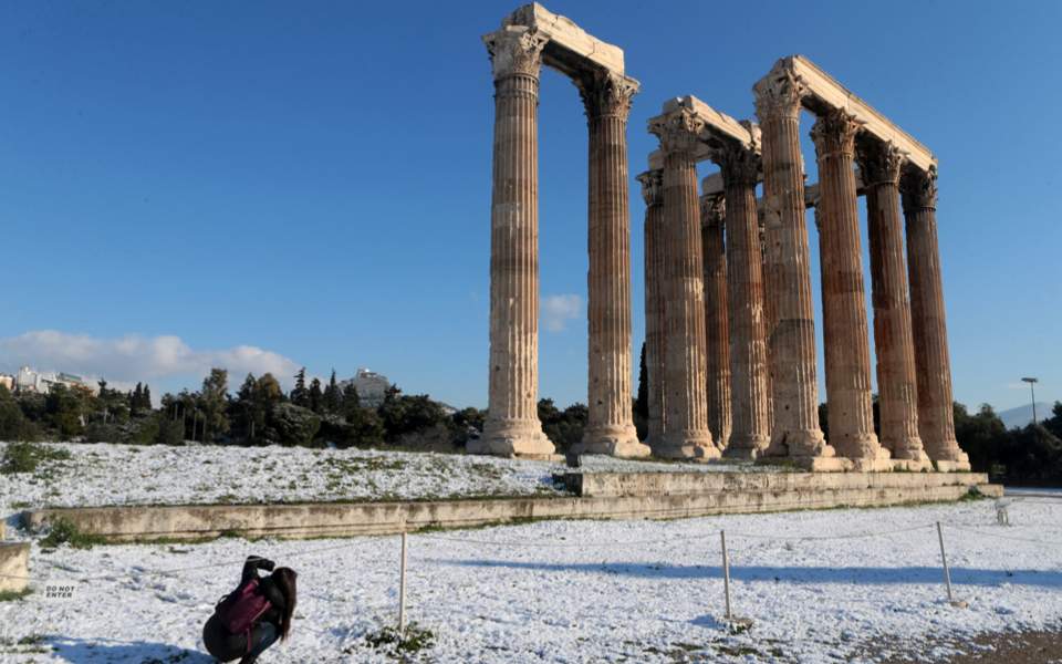 Acropolis Of Athens Coated In Rare Snowfall As Temperatures Plummet Across The Country