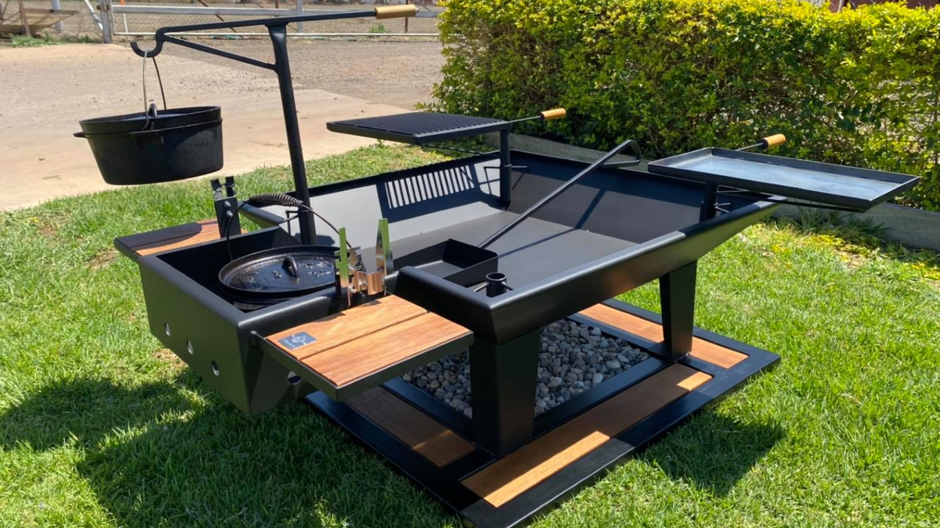 Attention Alpha Dads: Your Backyard Needs This Insane Camp Oven Pit