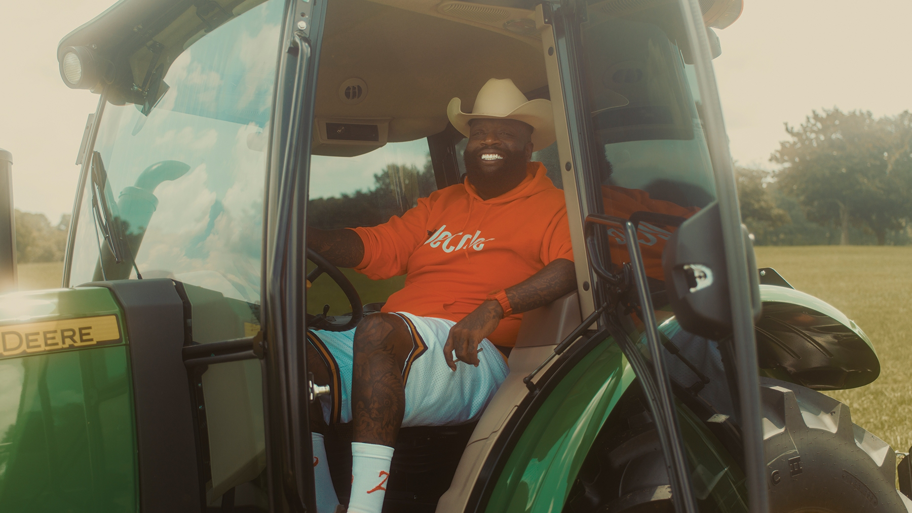 Rick Ross Saves Money By Mowing His Own Lawn