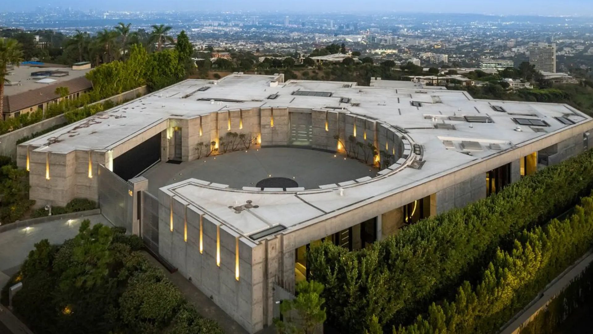 Oakley Founder’s $100 Million Brutalist Mansion Is A Proper Bond Villain Lair